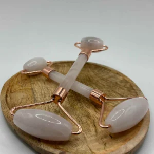 Rodillo facial de cuarzo rosa